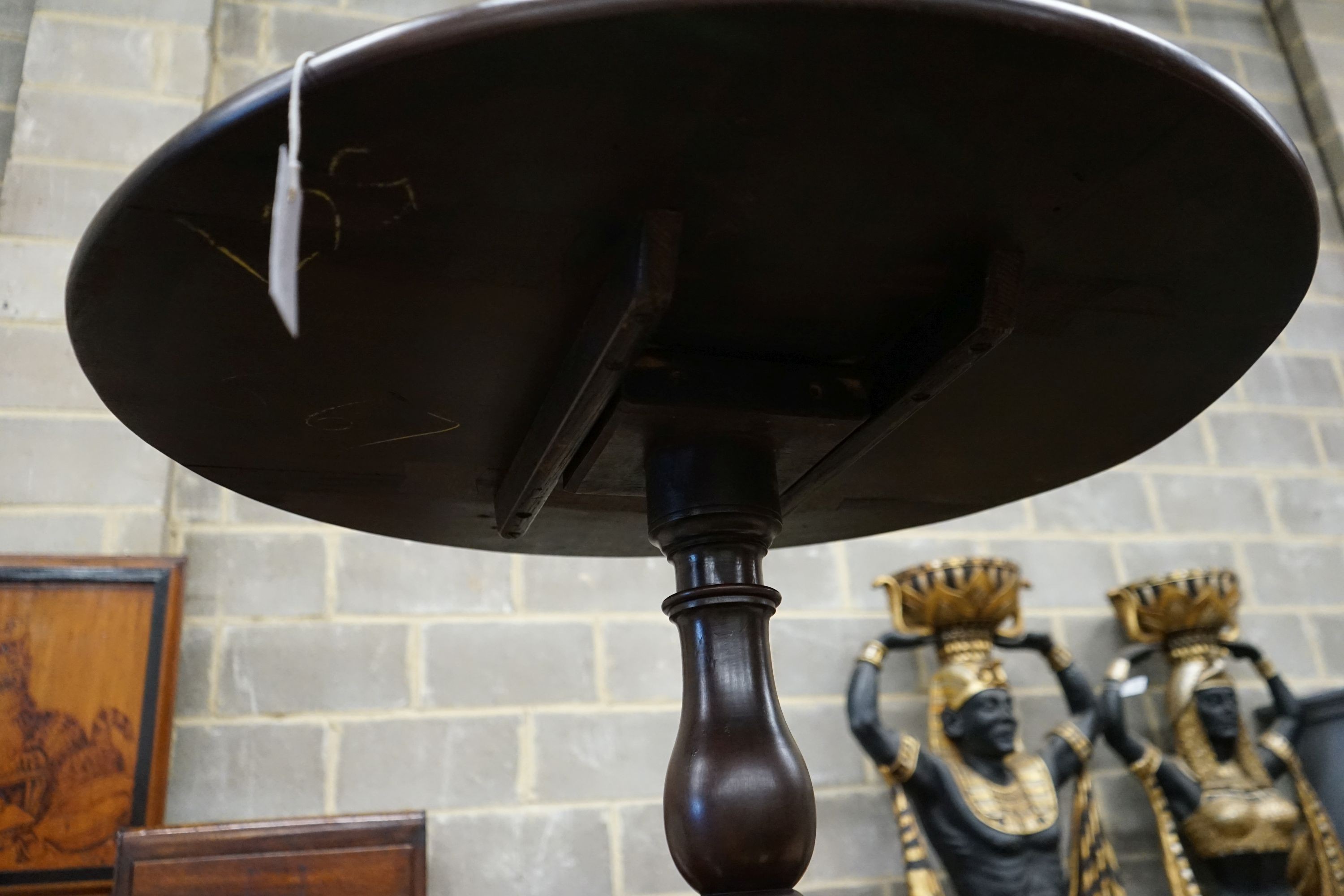 A George III circular tilt top tripod tea table, diameter 86cm, height 72cm